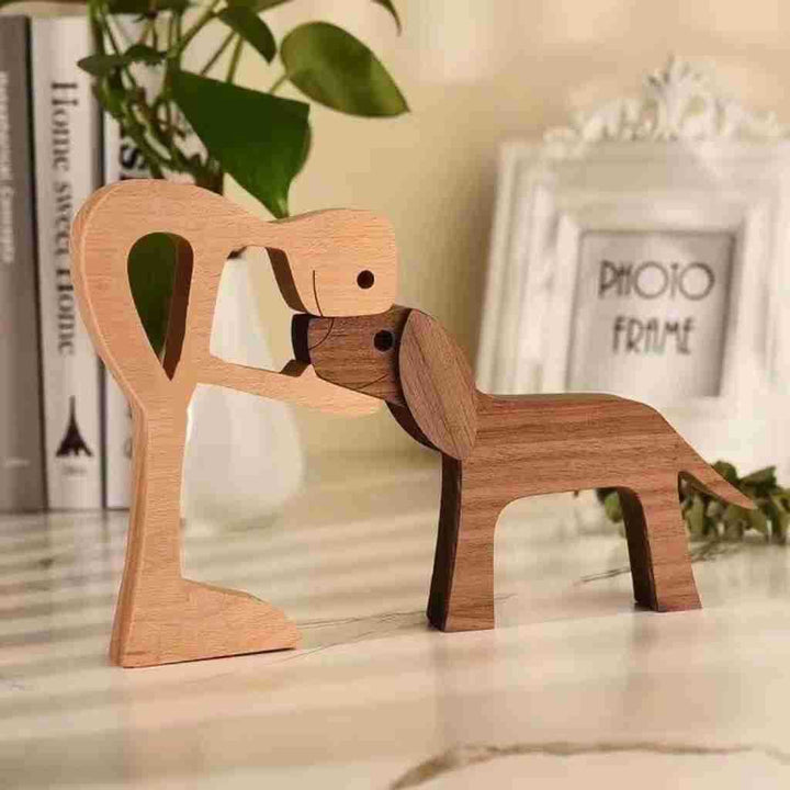 Holzskulptur Mensch und Hund