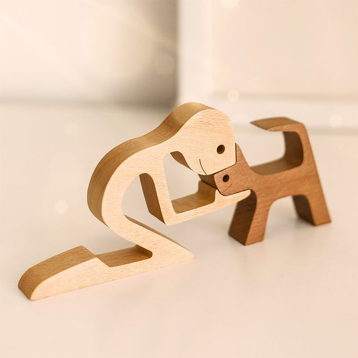 Holzskulptur Mensch und Hund