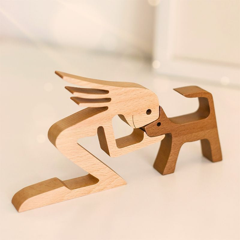 Holzskulptur Mensch und Hund