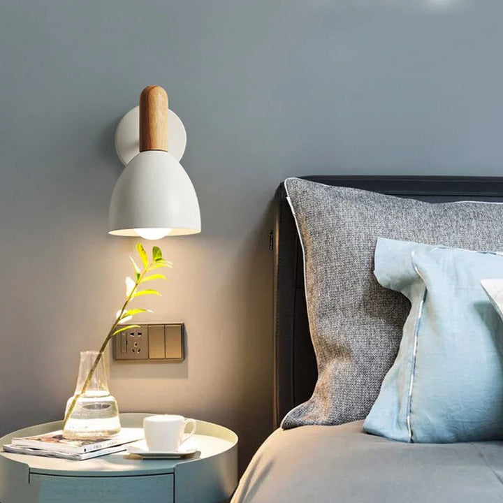 Graue Wandleuchte für stilvolle Beleuchtung im Schlafzimmer